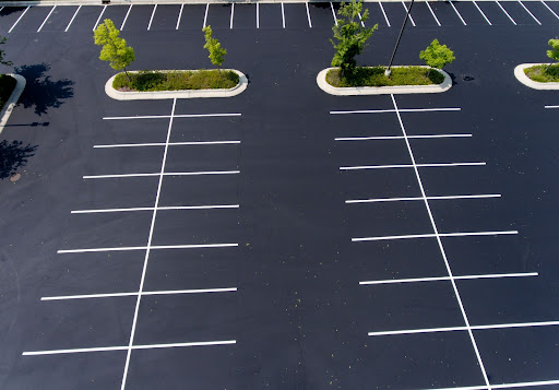 freshly maintained asphalt parking lot